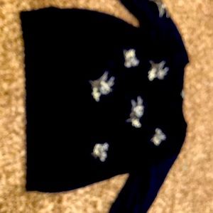 Navy blue sweater with embroidered flowers
